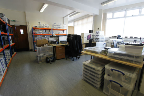 Lab assistants processing room for incoming and despatch